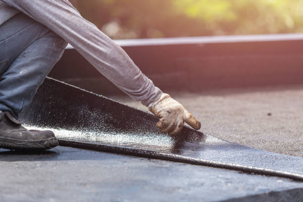 Professional Waterproofing technician working in Madisonville, KY
